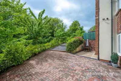 a brick driveway in front of a house at Personal En-suite in Shrewsbury