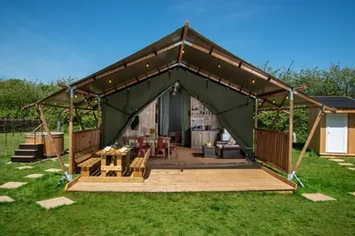 a gazebo with a table and chairs in it at 3 Bed in Talybont-on-Usk oc-wal374 in Talybont