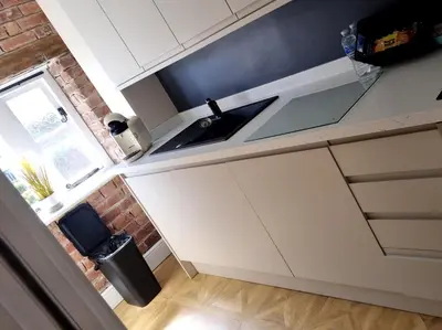 a kitchen with a sink and a counter top at Grade ll listed holiday home in Llanidloes
