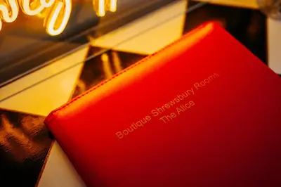 a red book sitting on top of a counter at Boutique Shrewsbury Rooms in Shrewsbury