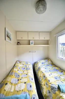 a bedroom with two beds and a window at Ideal rural location for beaches, hills and town in Bow Street