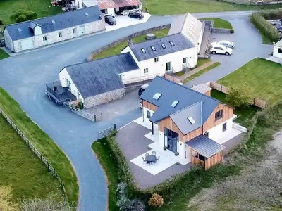 an aerial view of a house with a garage at Felin Hedd Peaceful Mill in Tregaron
