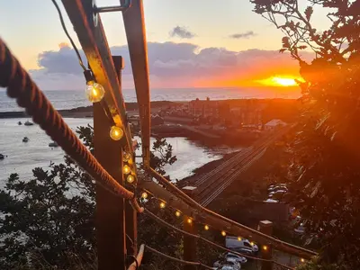 a view of the sunset from a roller coaster at Windycroft in Barmouth