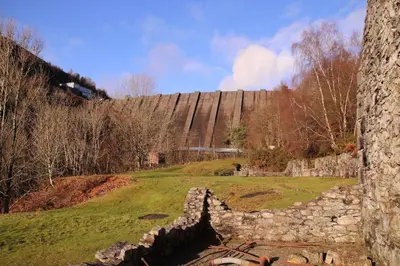 a view of the ruins of a stone wall at Garn Lodge in Newtown