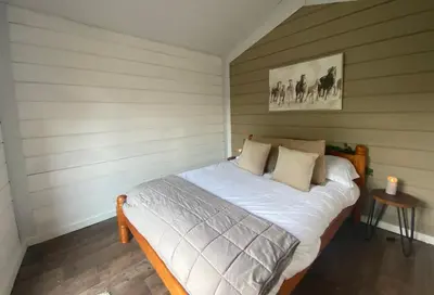 a small bedroom with a bed in a room at The Haystack in Oswestry