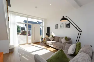 a living room with a couch and a table at The Lawley in Shrewsbury