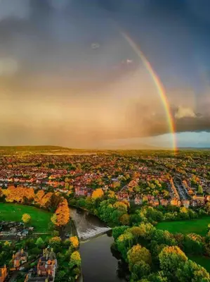 an aerial view of a city with a rainbow at The Old Stables, The River Severn, Shrewsbury in Shrewsbury