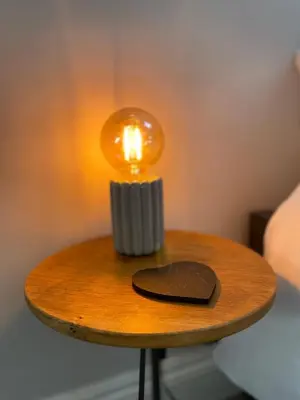 a light on a table with a heart on it at The Old Stables, The River Severn, Shrewsbury in Shrewsbury