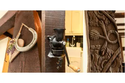 a close up of a wooden door with a handle at 12A College Hill by Sleep Shrewsbury in Shrewsbury