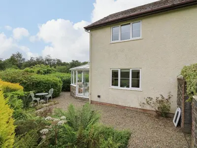 a house with a garden in front of it at Rhydygroes in Lampeter
