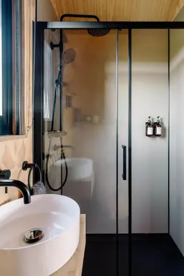 a bathroom with a sink and a shower at Vega in Llangollen