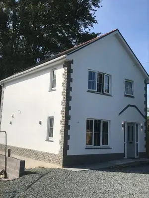 a large white house with a driveway at Haul y Bore in Aberystwyth
