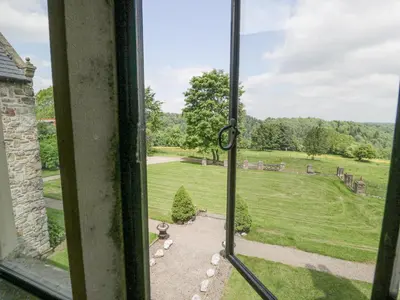 a view from a window of a yard at Pentre Hall in Oswestry