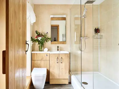a bathroom with a toilet and a sink and a shower at Onnen Fawr Farmhouse in Brecon
