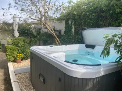 a jacuzziificialificialificialificialificialificialificialificialificialificialificial at Bryntirion Farmhouse Apartment with Hot Tub in Llanfair Caereinion