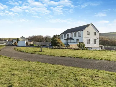 a house on the side of a road at Morlais in Llanon