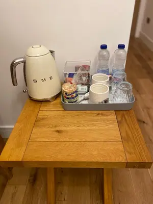 a mixer sitting on top of a wooden table at Dave & Kelz Deluxe king size studio room in Builth Wells