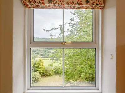 a window with a view of a field at 4 Bed in Corwen oc-88868 in Corwen