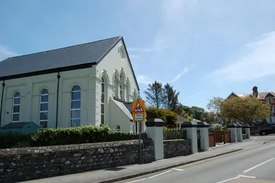 a church on the side of a street at Ty Capel in Tywyn in Tywyn