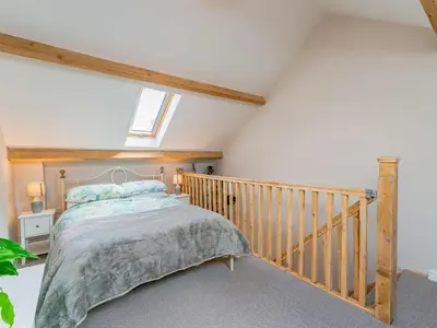 a bedroom with a bed in a attic at 1 Bed in Aberystwyth oc-83551 in Llanilar