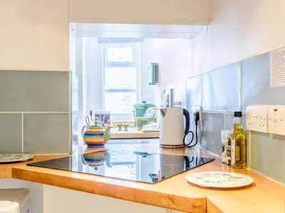 a kitchen with a counter top with a coffee maker at 1 Bed in Presteigne oc-53667 in Presteigne