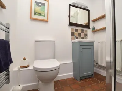 a bathroom with a toilet and a mirror at 1 Bed in Brecon oc-bn264 in Brecon