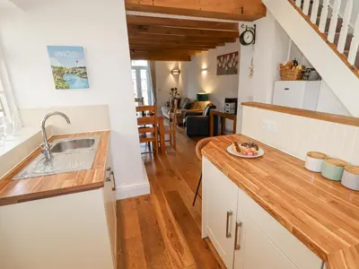 a kitchen with a sink and a counter top at No 9 On The Riverbank in Llangollen