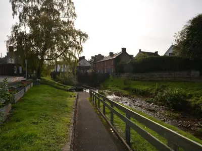 a path next to a fence next to a river at 2 Bed in Brecon oc-59734 in Talgarth