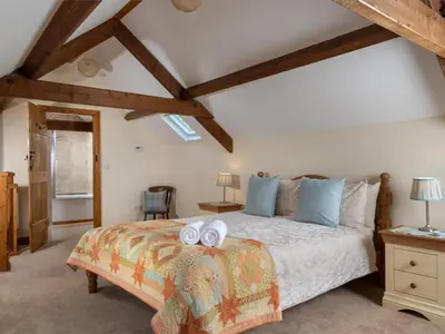 a bedroom with a bed with two towels on it at 1 Bed in Brecon oc-bn270 in Llansantffread