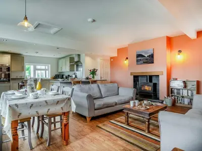 a living room with a couch and a table at 2 Bed in Llangammarch Wells oc-bn059 in Garth