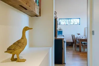 a wooden duck statue sitting on a counter in a room at Outshot Barn in Hay-on-Wye