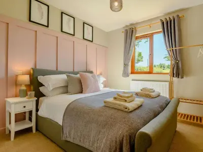 a bedroom with a bed with towels on it at 2 Bed in Llandrindod Wells oc-89064 in Nantmel