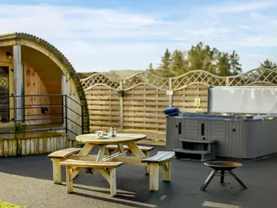a patio with a picnic table and a grill at 2 Bed in Rhayader oc-90274 in Saint Harmon