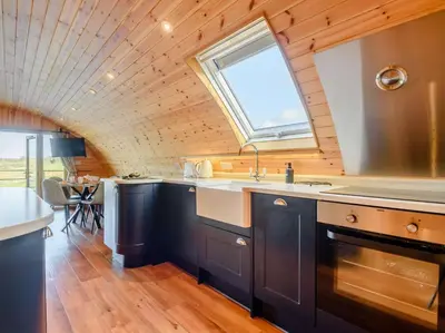 a kitchen with a sink and a window at 2 Bed in Rhayader oc-90280 in Saint Harmon