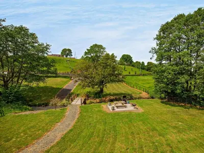 an overhead view of a large field with trees at 1 Bed in Church Stretton oc-90929 in All Stretton