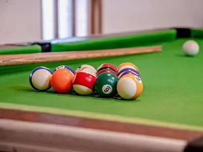 a group of billiard balls on a pool table at 2 Bed in Brecon oc-91085 in Llangorse