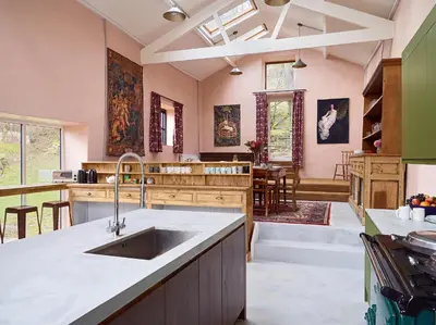 a kitchen with a sink and a counter top at The Castle, Capel-y-Ffin, The Black Mountains in Abergavenny