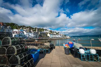 a group of nets on a pier next to the water at Brynhoreb in Aberdyfi