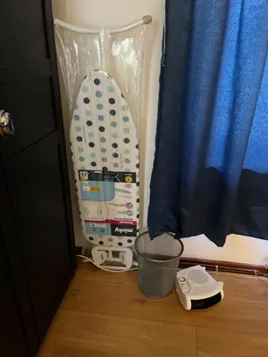 a hair dryer and a bowl on a floor next to a window at King room - PenrhynCoch - Aberystwyth in Aberystwyth