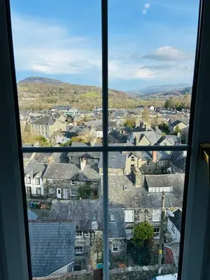 a view of a city from a window at Dolgellau Grand Heights Apt in Dolgellau