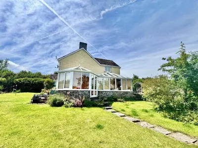 a house with a large yard with a house at 3 Bed in Brecon oc-93947 in Llanywern
