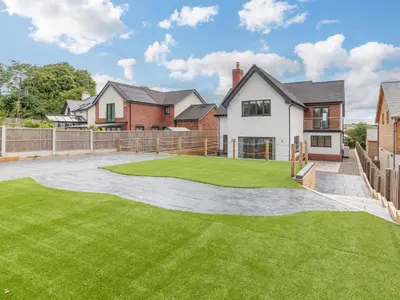 a yard of a house with a green lawn at 4 Bed in Bishops Castle 94072 in Bishops Castle