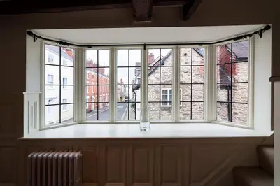 a large window in a room with a radiator at Grade 2 listed , In the heart of Historic Ludlow. in Ludlow
