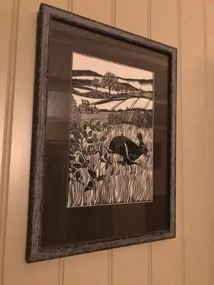 a picture of a painting of a bird on a wall at Cabin in the hills near Dolgellau in Dolgellau