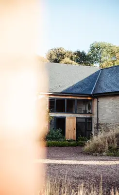 a house with a large window on the side of it at The Granary Wales in Kington