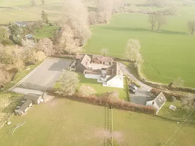 an aerial view of a large house in a field at Stunning studio flat with dedicated private garden in Shrewsbury