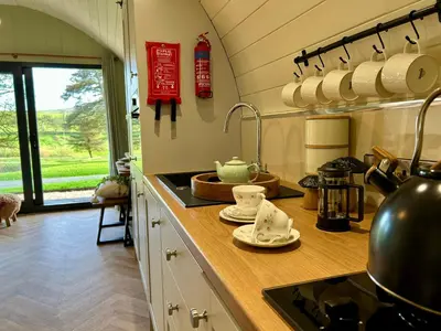 a kitchen with a sink and a counter top at Willow in Llanidloes