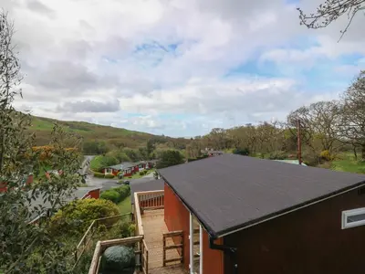 an overhead view of a house with a black roof at Y Goedlan in Tywyn