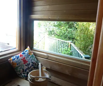 a window in a room with a view of a balcony at 2-Bedroom cottage in Barmouth old town with sea views in Barmouth