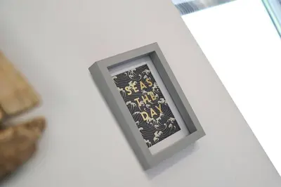a picture of a framed picture on a wall at Relaxing Aberdovey Retreat, close to beach in Aberdyfi
